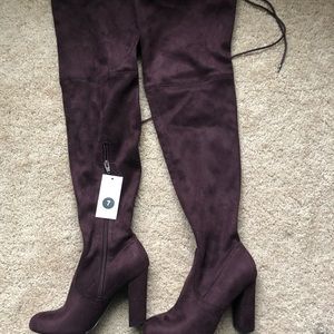 Knee length boots, never been worn.